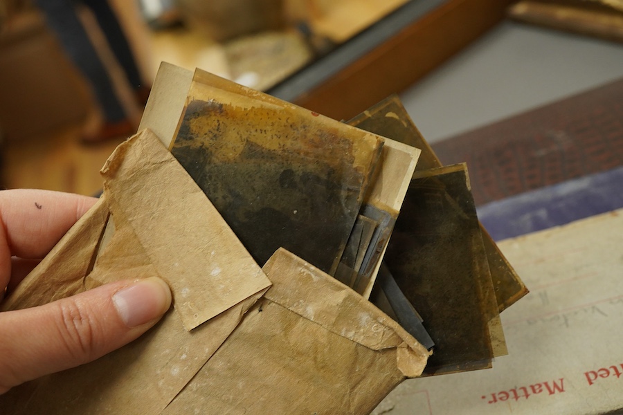 An early 20th century photograph and postcard album of Chinese and Japanese scenes, together with some negatives, etc.